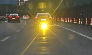 沪昆高速一车辆被曝车尾底盘下装黄色远光灯长时间闪后车，交警：已对其进行相应处罚